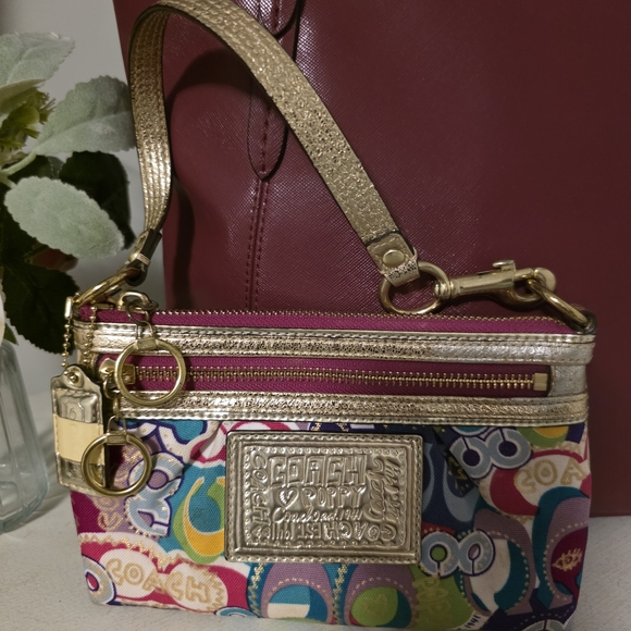 Coach Handbags - Coach Colorful Wristlet with Gold Details